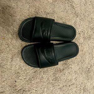 Black Nike slides